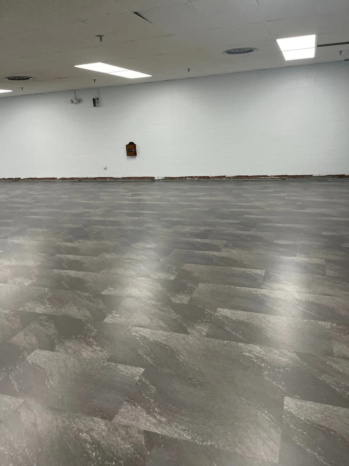 Wood-look LVP flooring installed in a large Connecticut commercial space