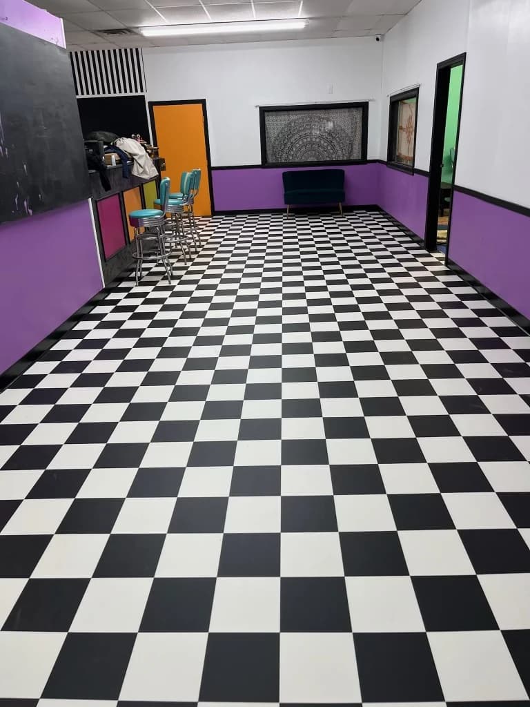 Black and white checkerboard tile floor installed in Connecticut