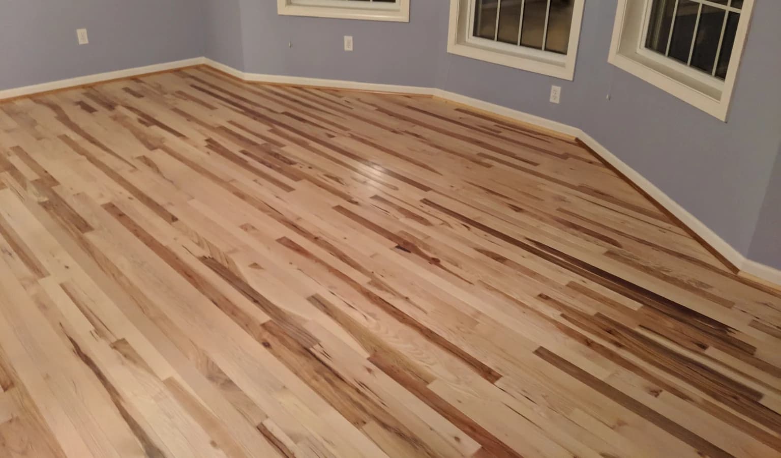 Hardwood, tile, and carpet flooring installation in a Connecticut home