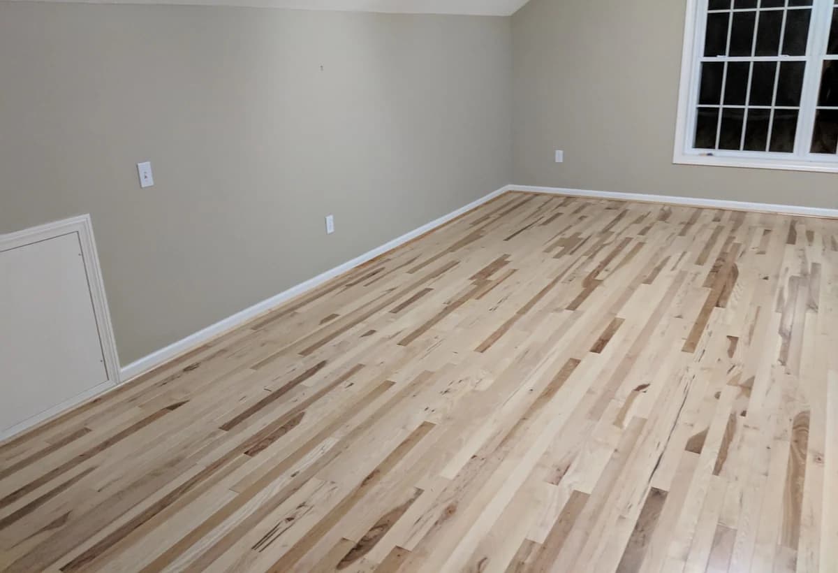 Light hardwood flooring installed in a Connecticut room