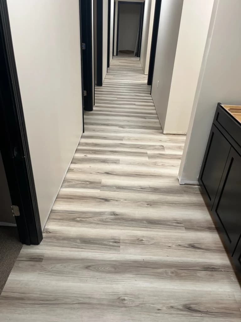 Wood-look LVP flooring installed in a Connecticut office hallway