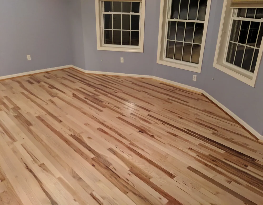 Light hardwood room flooring installed in Connecticut