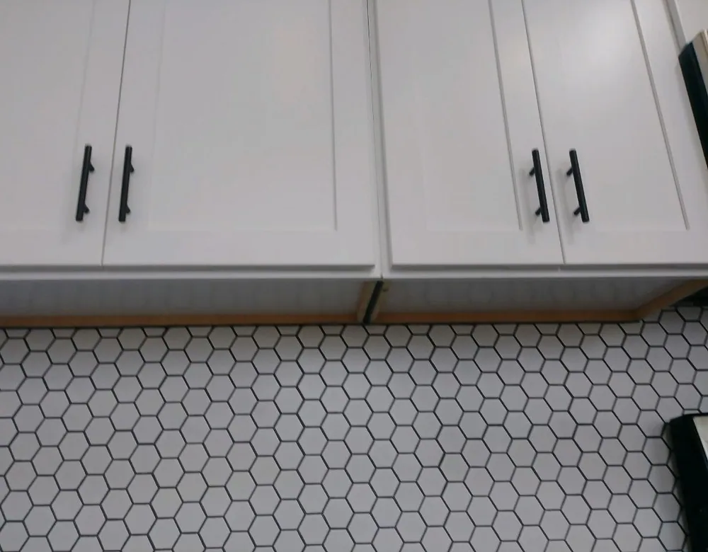 White hex tile bathroom floor installed in Connecticut