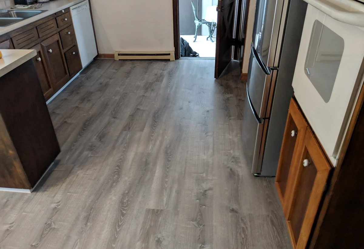 Gray LVP kitchen flooring installation in Connecticut